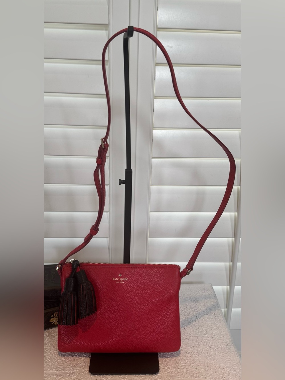 kate spade red pebbled leather tassel crossbody